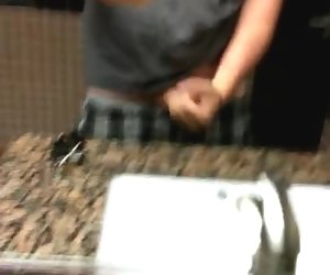 cock jerk in public bathroom