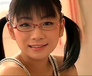 Japanese nerdy girl Ami Tokito in her pink bedroom