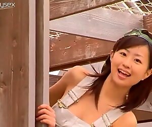 Adorable young Japanese model Hitomi Kitamura starring in a swim wear ad photoshoot