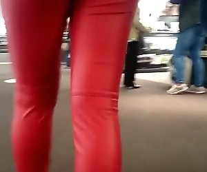 Candid tight ass teen in red leather pants!