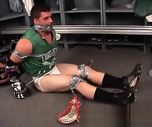SUG Lacrosse player tape bound and gagged