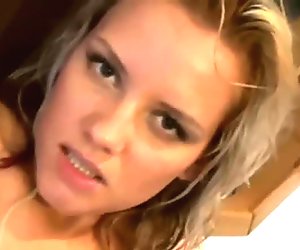 Blonde busty babe rubs her naughty cunt and moans in delight